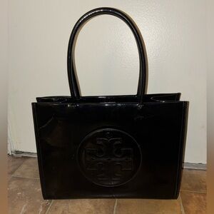 Tory Birch Black Patent Tote Bag with Embossed Logo.